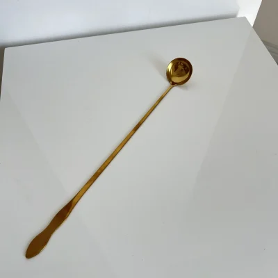 ملاقه پارچ طلایی